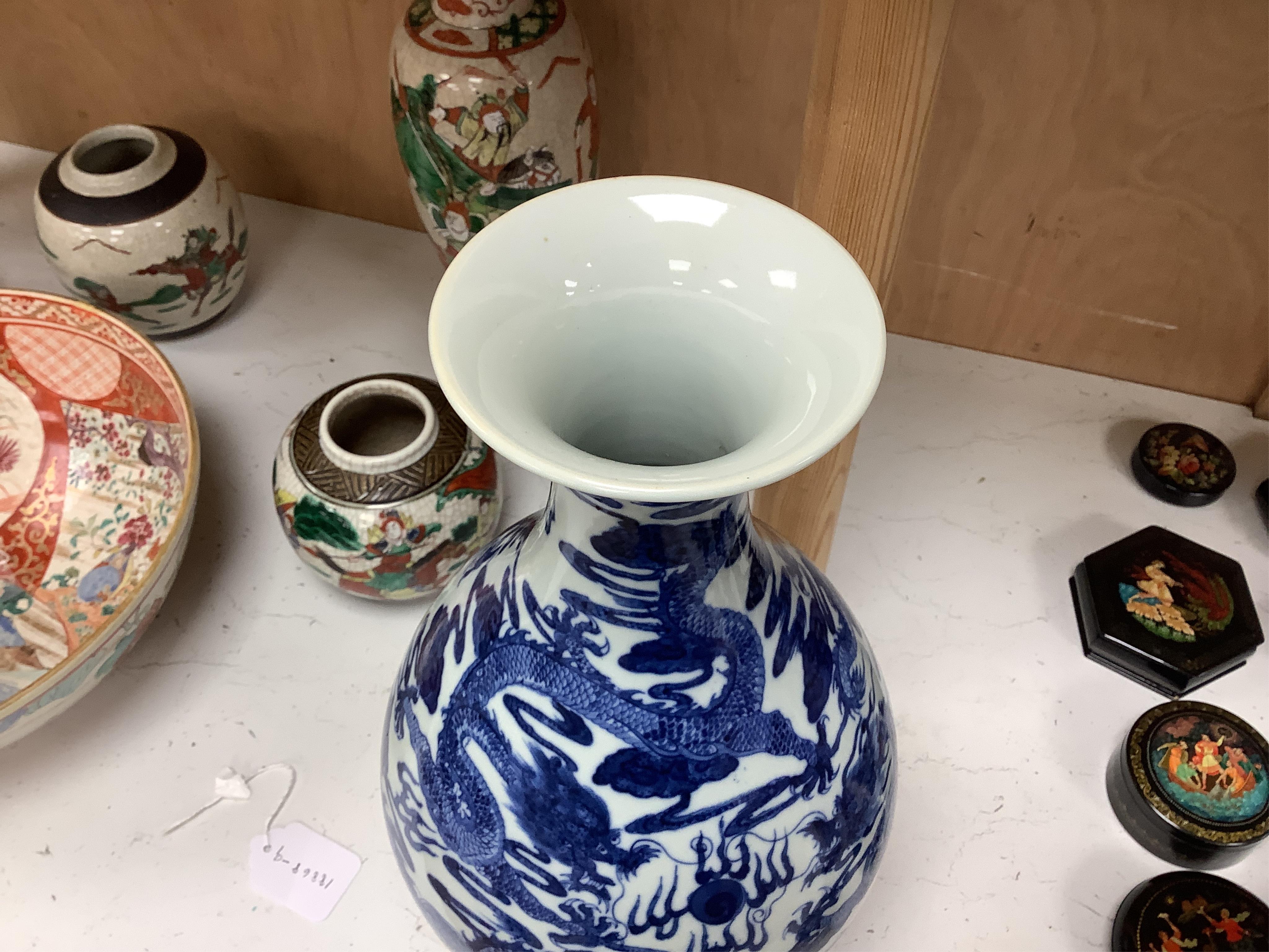 A large Chinese blue and white dragon vase, 40 cm high.